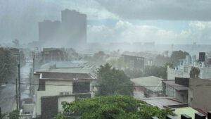 Heavy rains wash over the streets of Kapitolyio, Pasig City, Manila, Philippines during Easter Holy Week.